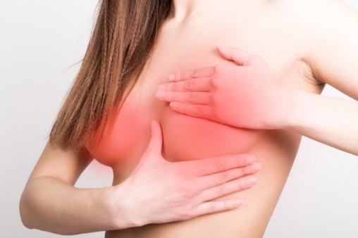 Почему болит грудь во время месячных